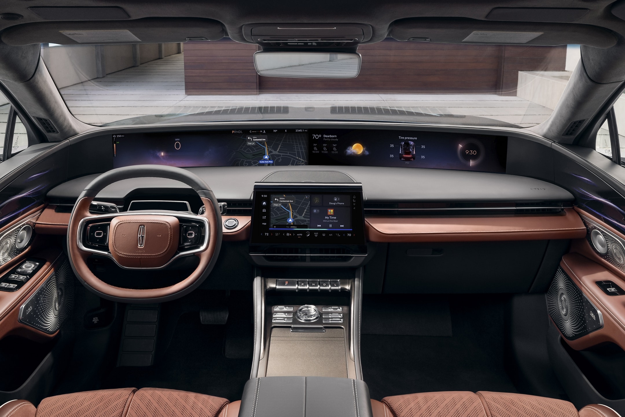 The interior of a 2024 Lincoln Black Label Nautilus® SUV is shown in the Redwood interior theme